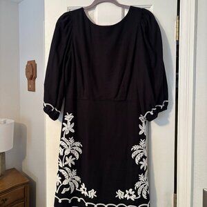 Brand new black dress with white embroidery
